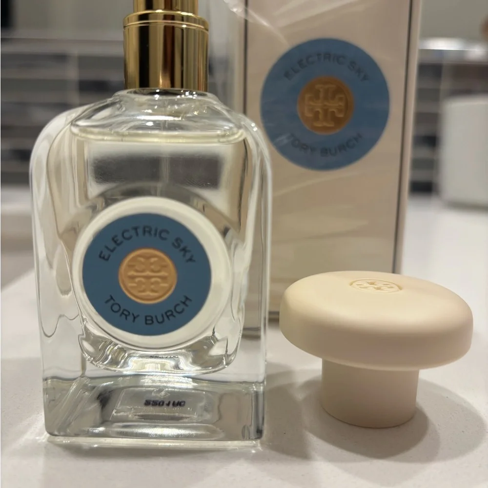 Tory Burch Electric Sky Fragrance with Gold and Cream Accents. 1.7 Fl Oz. - Picture 1 of 2
